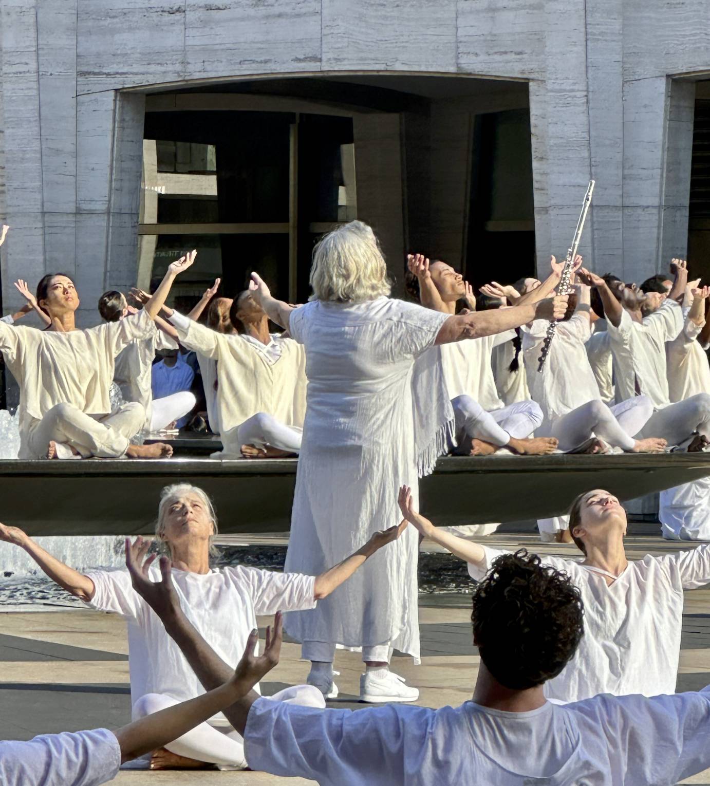 musicians and dancers lifting eyes arms hearts to the sky